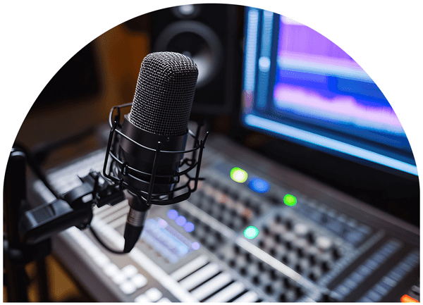 A recording console with a microphone in front